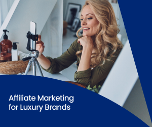 A blonde creator for a luxury brand smiles while making content with her phone